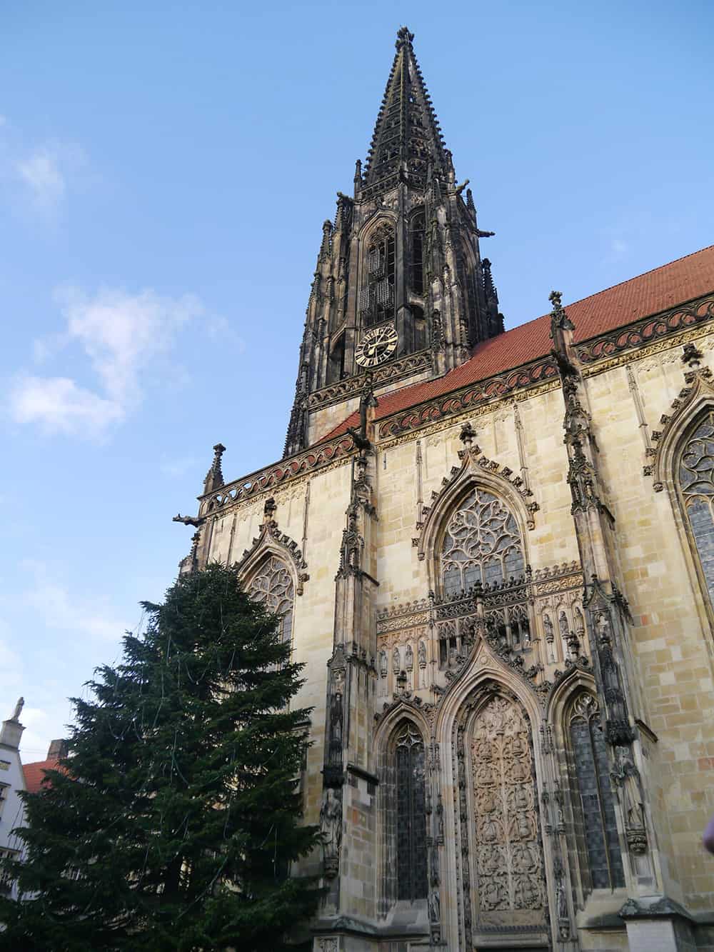 a church and a Christmas tree in Munster, Germany