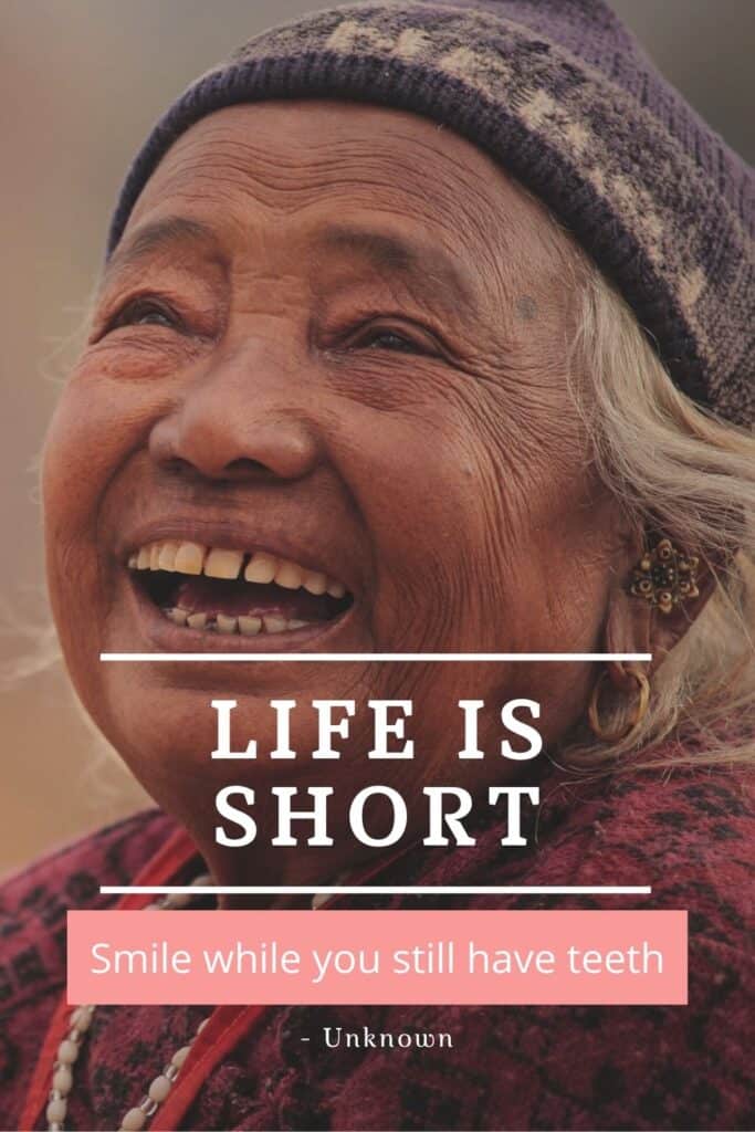 Life is short, smile while you still have teeth, quote graphic
