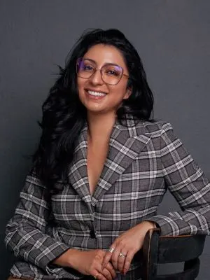 a woman posing for a professional photo