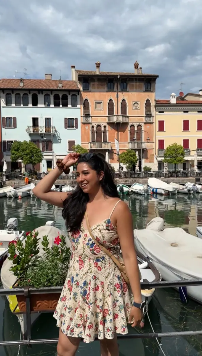 a woman standing in Lake Garda, Italy