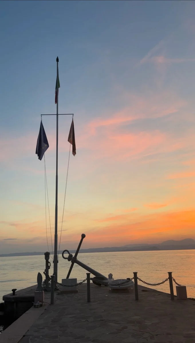 a view of the sunset in Lake Garda, Italy